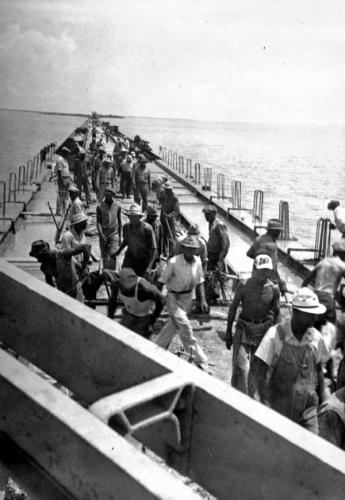 Extending the Florida east Coast Railroad from Miami to key West starting in 1906. Some black workers were hired but the railroad preferred foriegn-born whites.