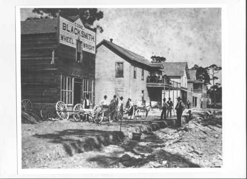 Black Miami 1896 street scene showing blacks laying streets