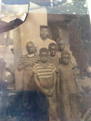 The Dunn family_ Hicksville_ Long Island_ New York_ 1949. I am second row_ left with hand on chest..