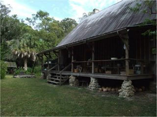 The back porch of the Dudley farmhouse. The farm is restored to represent the Florida Cracker way of life.