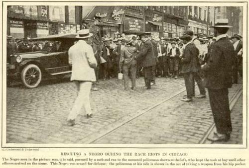 chicago race riot negro being rescued 