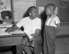 education teacher conference with student