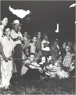kkk- A crowd watches a Ku Klux Klan rally in Tallahassee September 1_ 1956 close up Florida State archives Neg 18127 nn