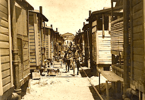 overtown children playing in alley between houses Romer collection